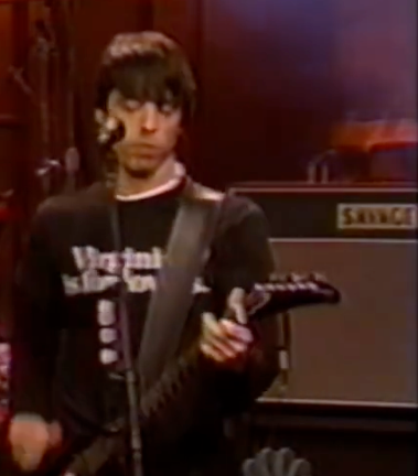 Foo Fighters / Dave Grohl playing his Savage Blitz 50